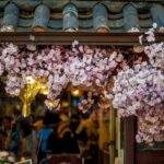pink petaled flowers on roof shingles