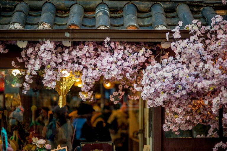 pink petaled flowers on roof shingles